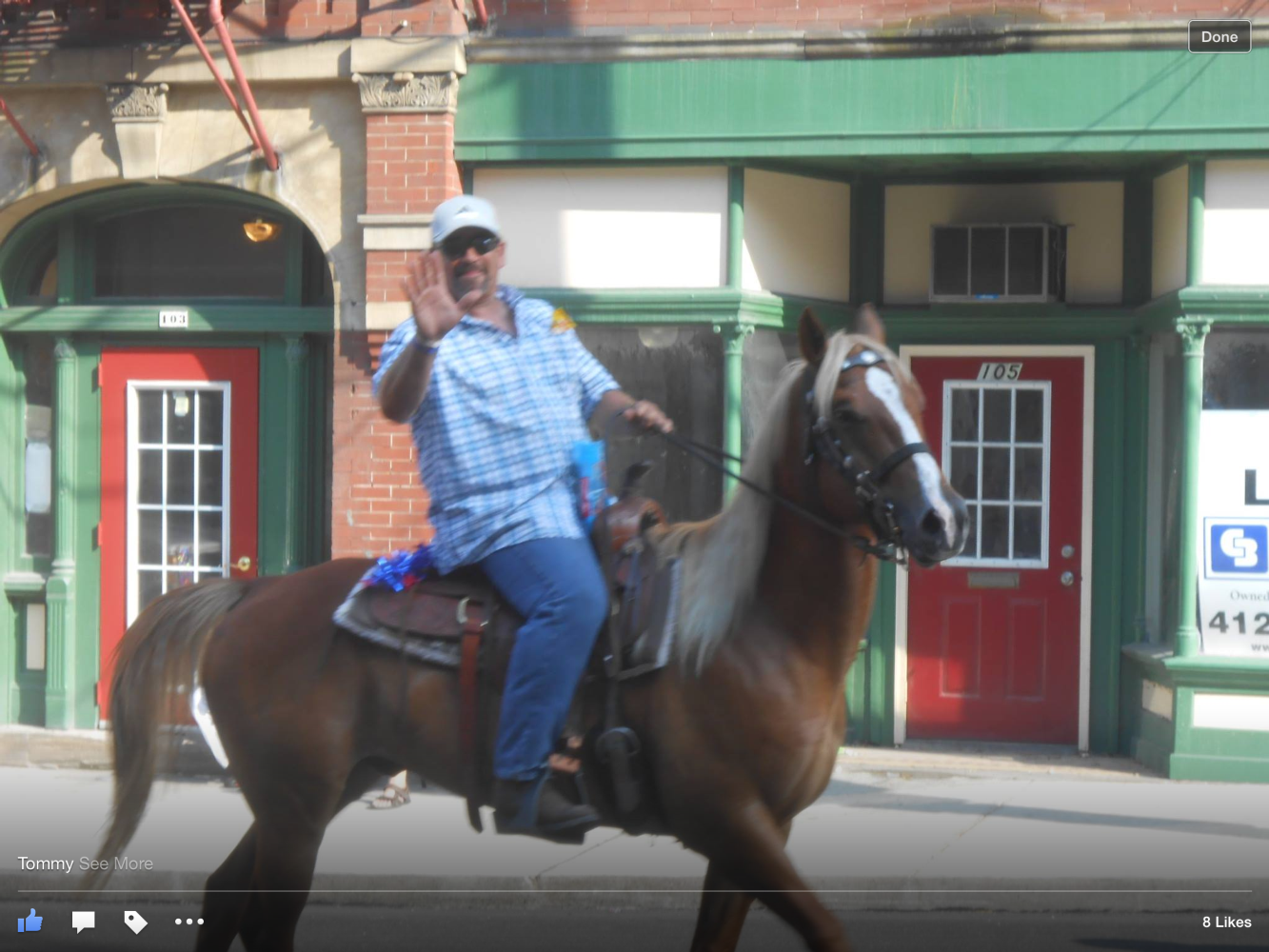 Tom Godwin riding Nailer in the McSummerfest Parade.