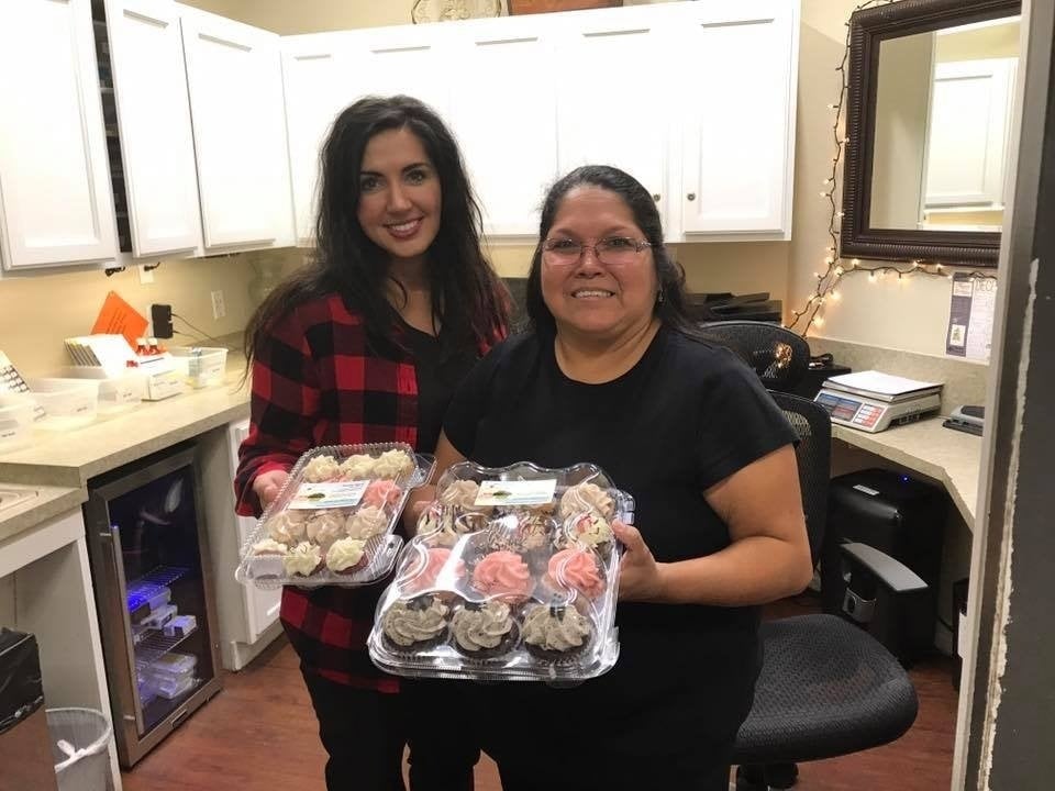 Two Women With Two Cupcake Boxes