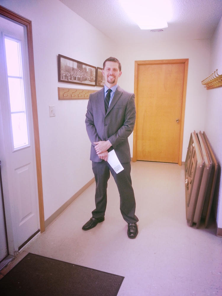 Spencer Hunsucker helping greet visitors