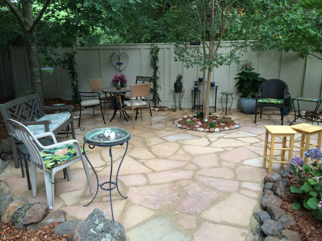 AFTER - Brightened up seating area for hosting garden parties.