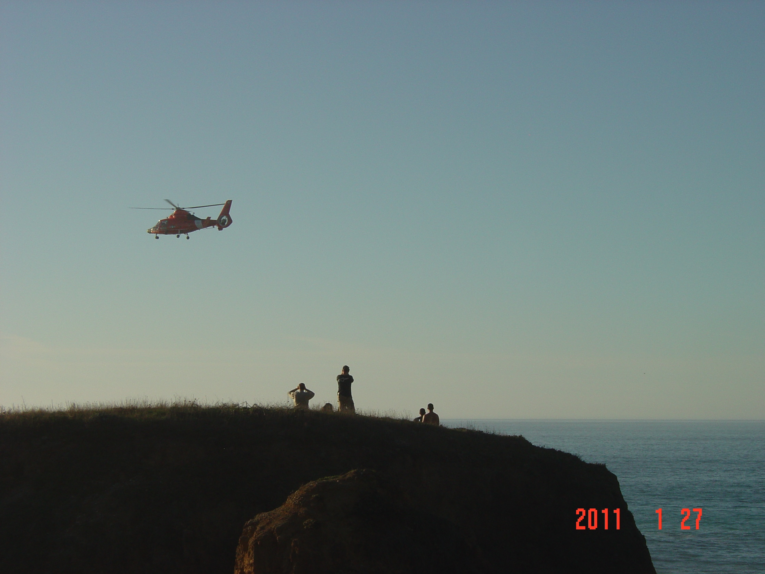 Coast Guard Helicopter trying to locate person in ocean