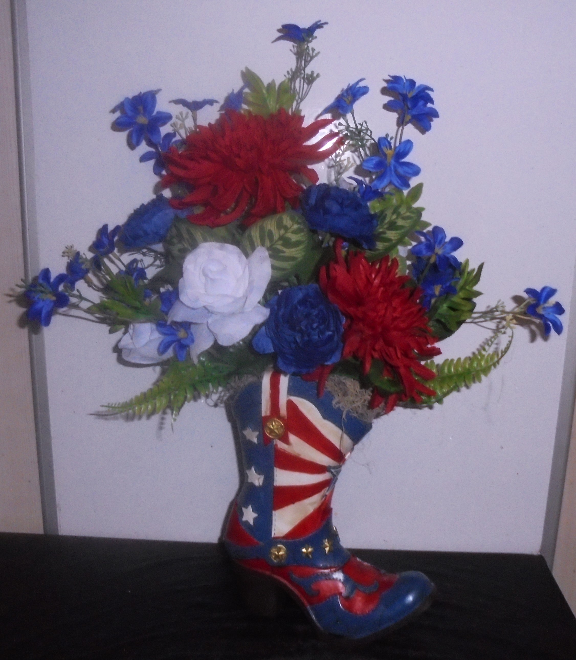 (44) "Silk" Boot Arrangement
(Red, White & Blue)
$60.00