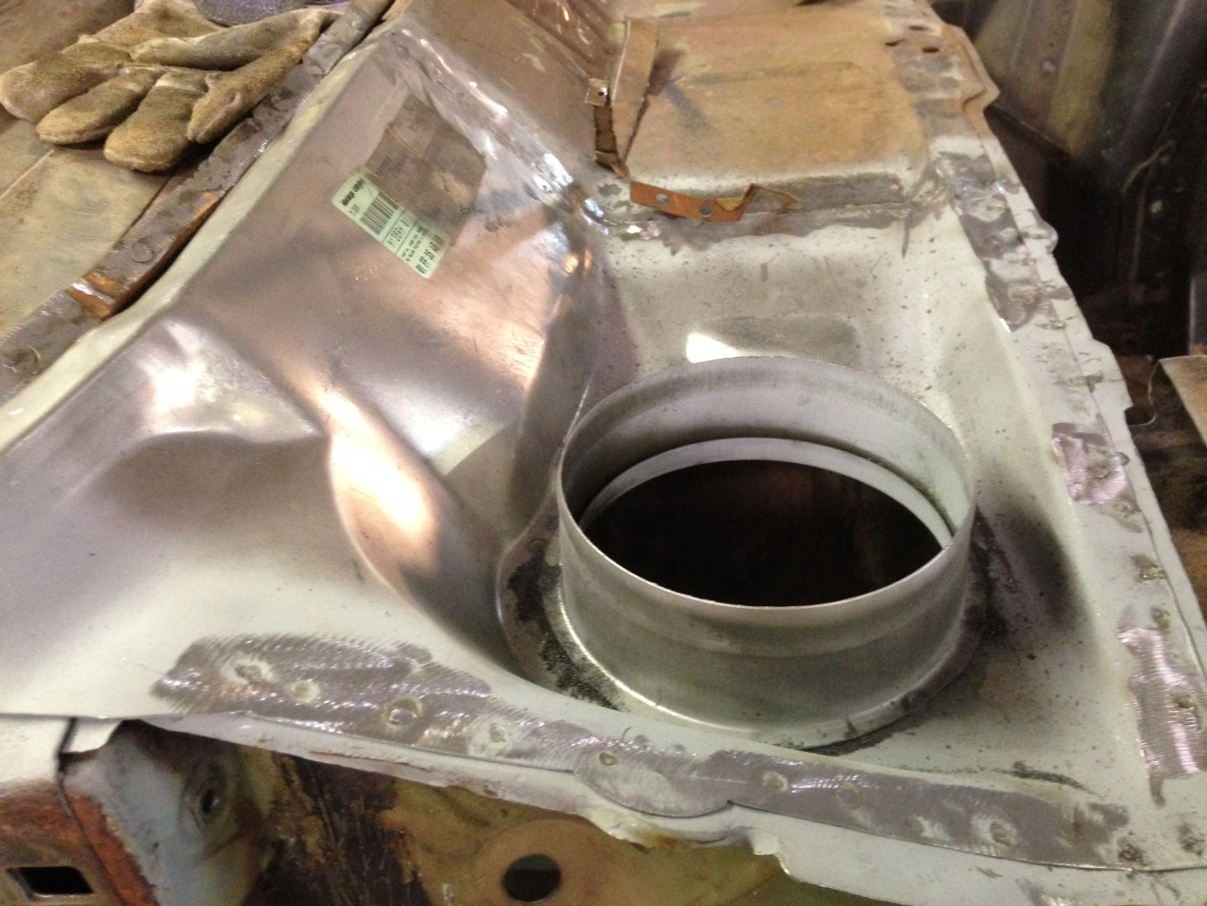 Added both new cowl patches and seam sealed it to prevent future damage.