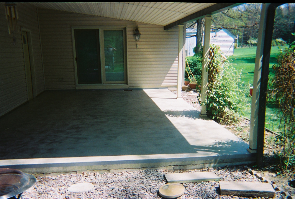 Plain concrete porch before overlay