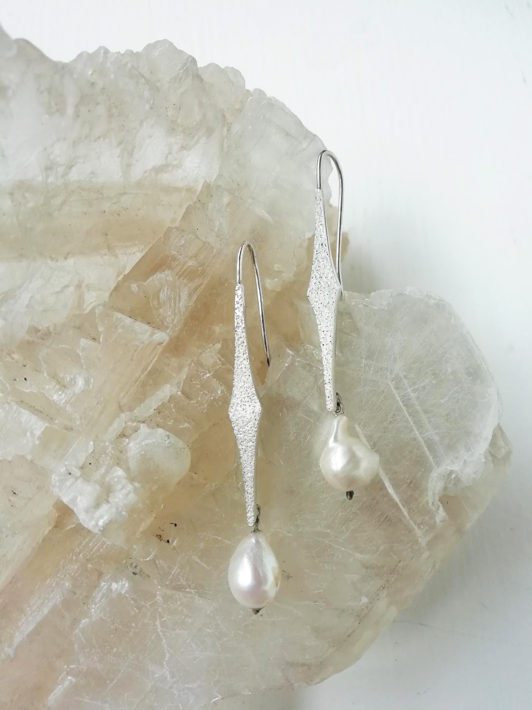 AR 238
Plata y perla