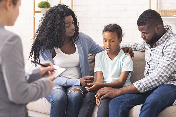 Girl and Her Parents at Psychologist Consultation