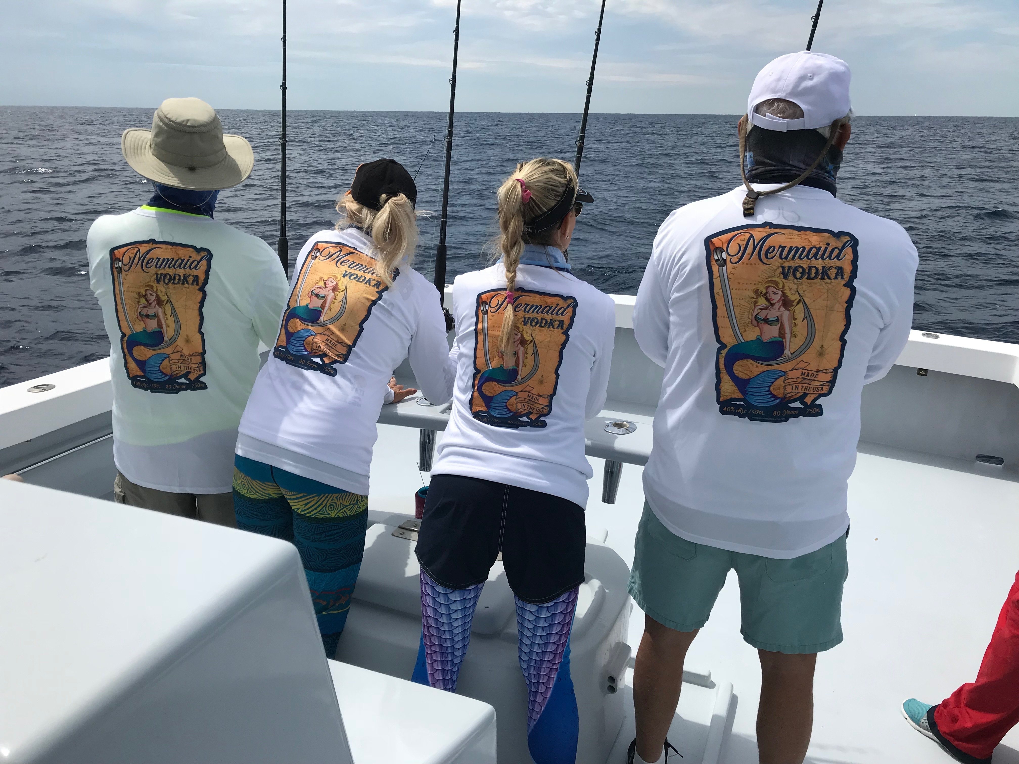 Fishing Enthusiasts Wearing Our Shirts