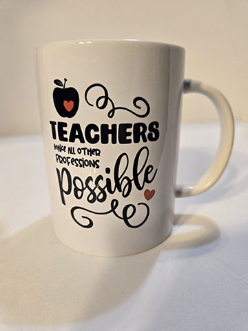15oz ceramic mug featuring a teachers make professions possible design