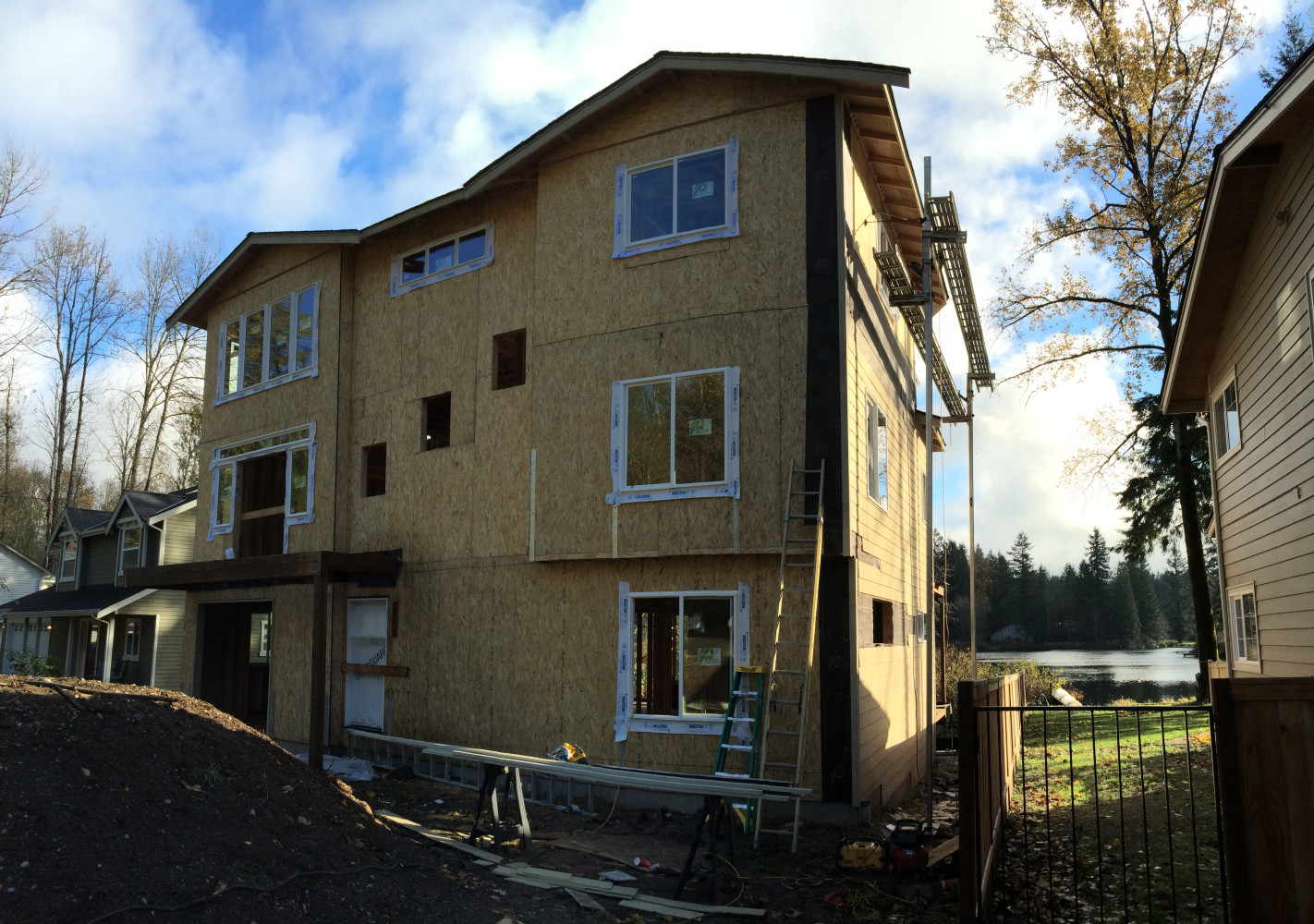 Carnation home. Here is a custom new construction home. We installed new James Hardie Plank Siding and trims. See other picture for the after installation.