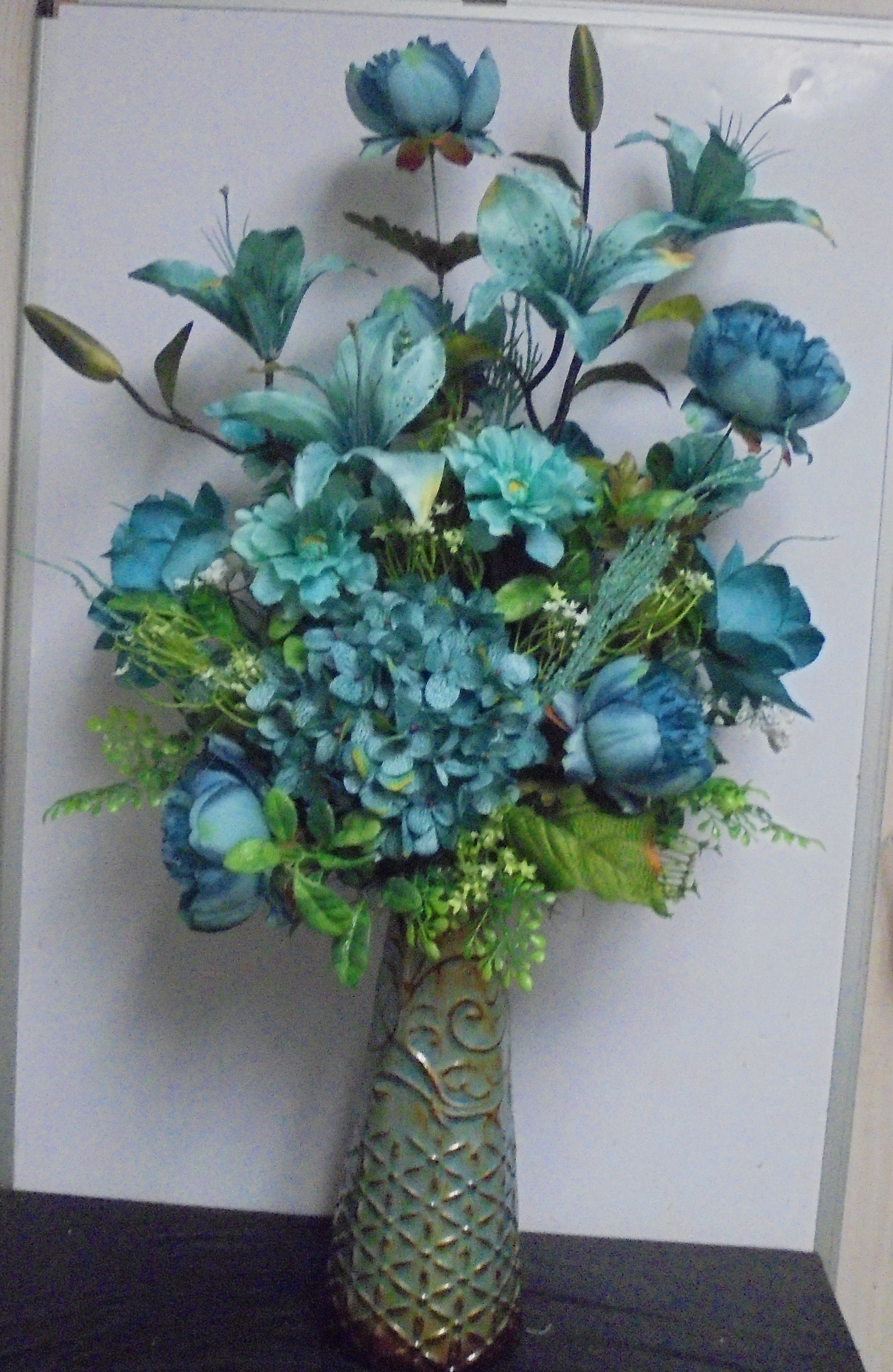 (53)  "Silk" Vase Arrangement
(Teal)
$75.00