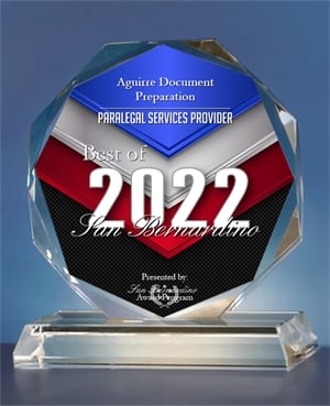 Crystal award with text: 'Aguirre Document Preparation, Paralegal Services Provider, Best of 2022, San Bernardino', presented by San Bernardino Award Program.