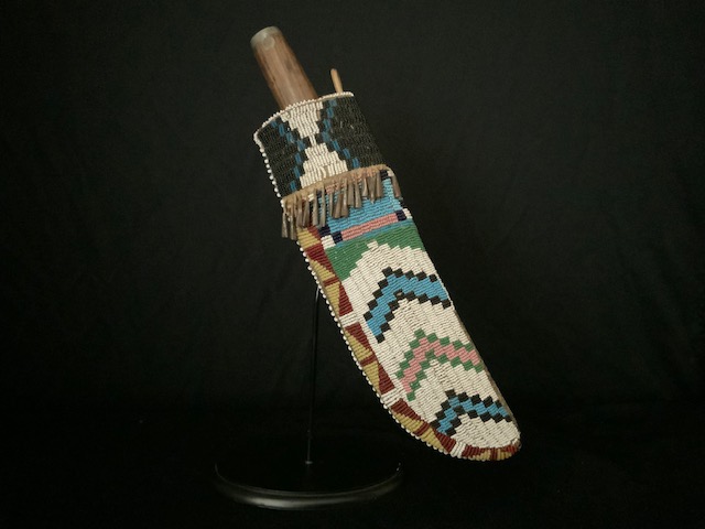 PRODUCT PROFILE :
Product No. : #11234
Description : Plains (Arapaho) 
Knife  Sheath 
PRODUCT NARRITIVE:
• Native tanned hide knife sheath , 
with painted parfleche liner. 
• Collection history available. 
• Size: 10" length.  Circa: 1870. 

