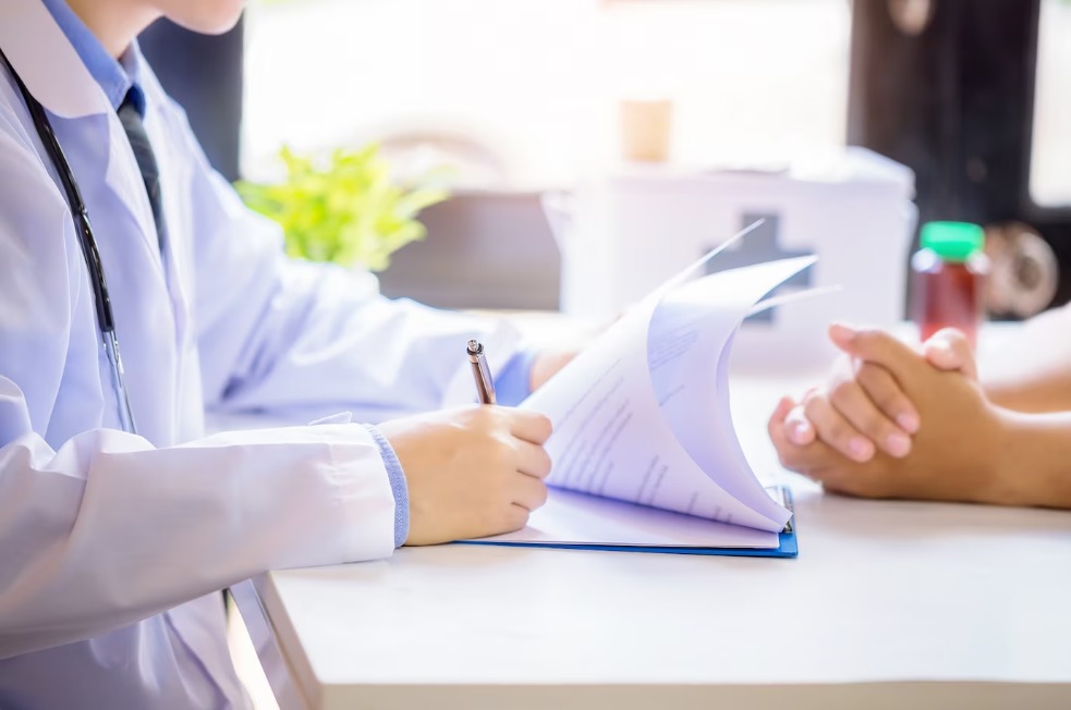 Female doctor and patient smiling