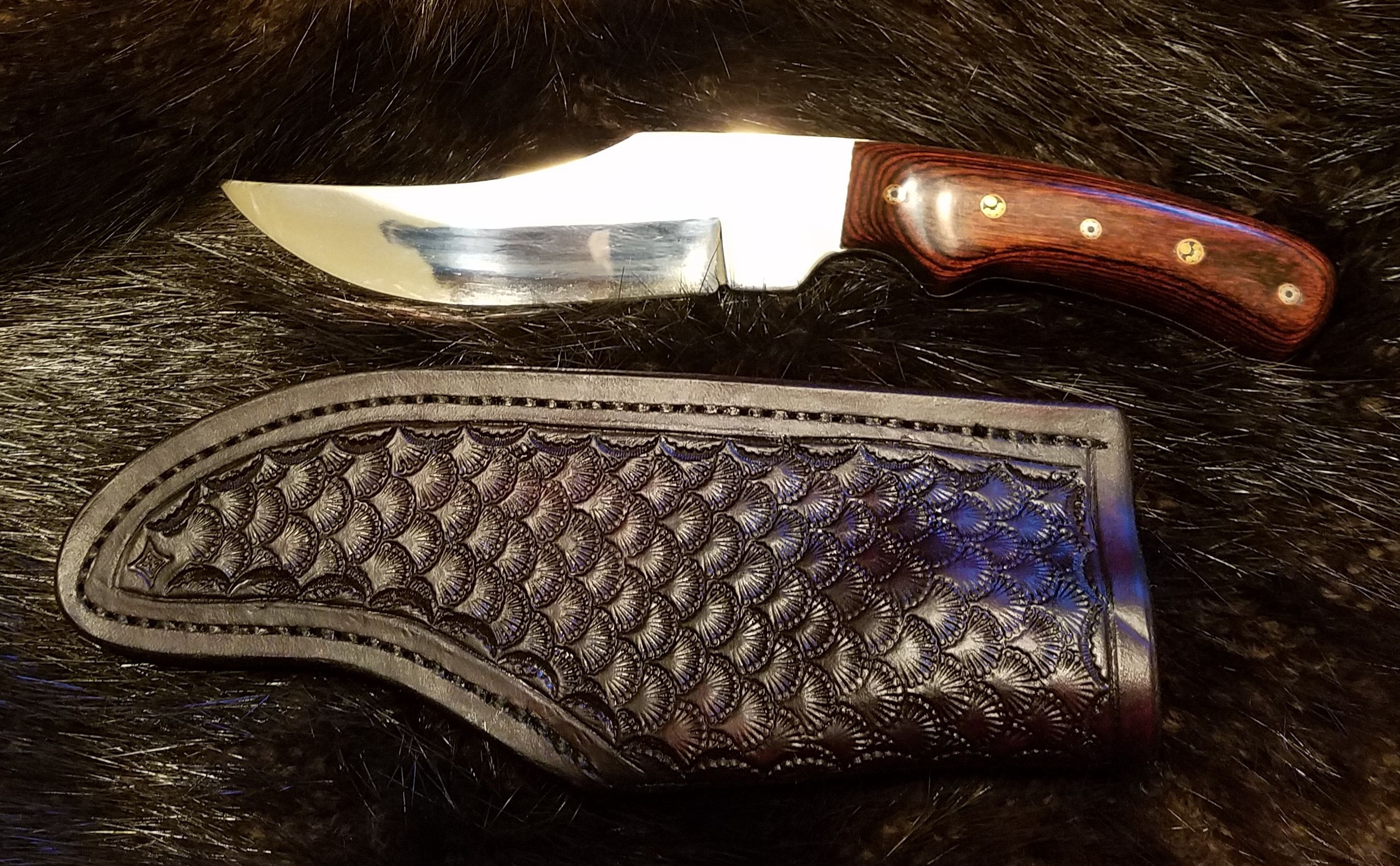 Hunter with Hand Tooled, Hand Stitched Leather Sheath,   $190.00