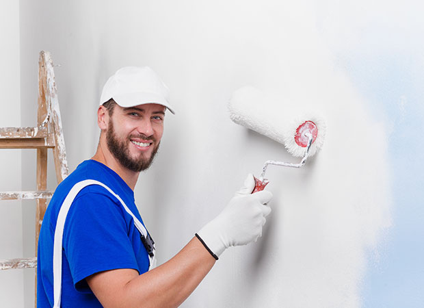 Painter Painting Wall