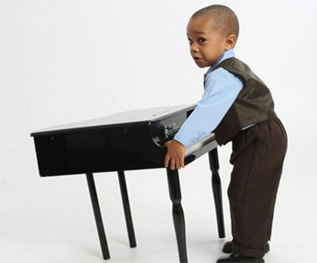 Kid With a Small Piano