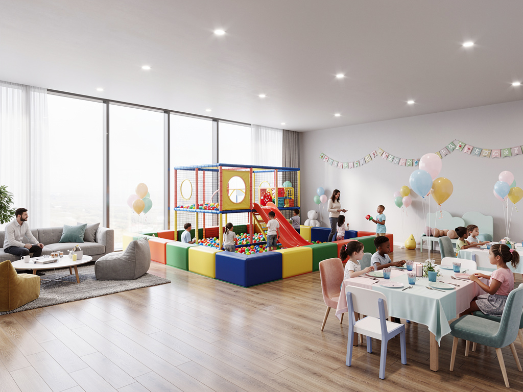 Fiesta infantil en sala de juegos moderna con parque de bolas, tobogán, globos y mesas decoradas