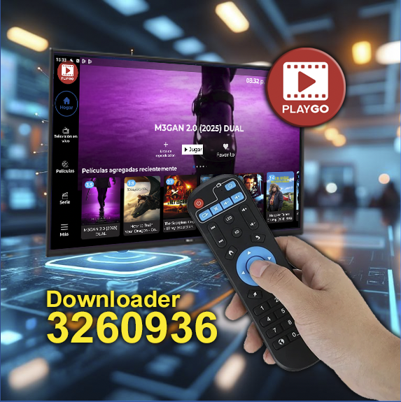 Hombre sonriente con barba trabajando en una oficina moderna con múltiples pantallas de computadora al fondo.