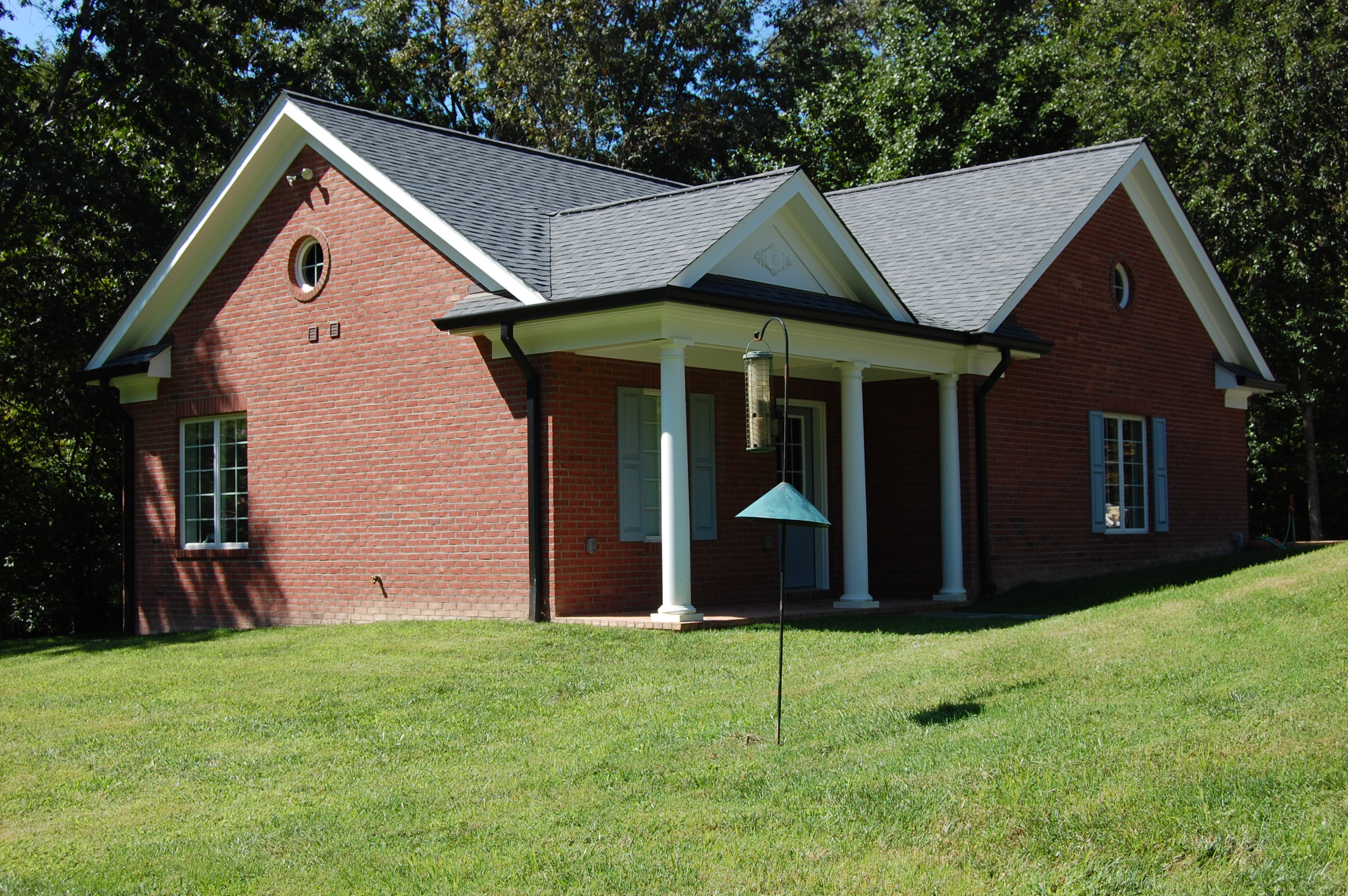 three car garage with pool bath house