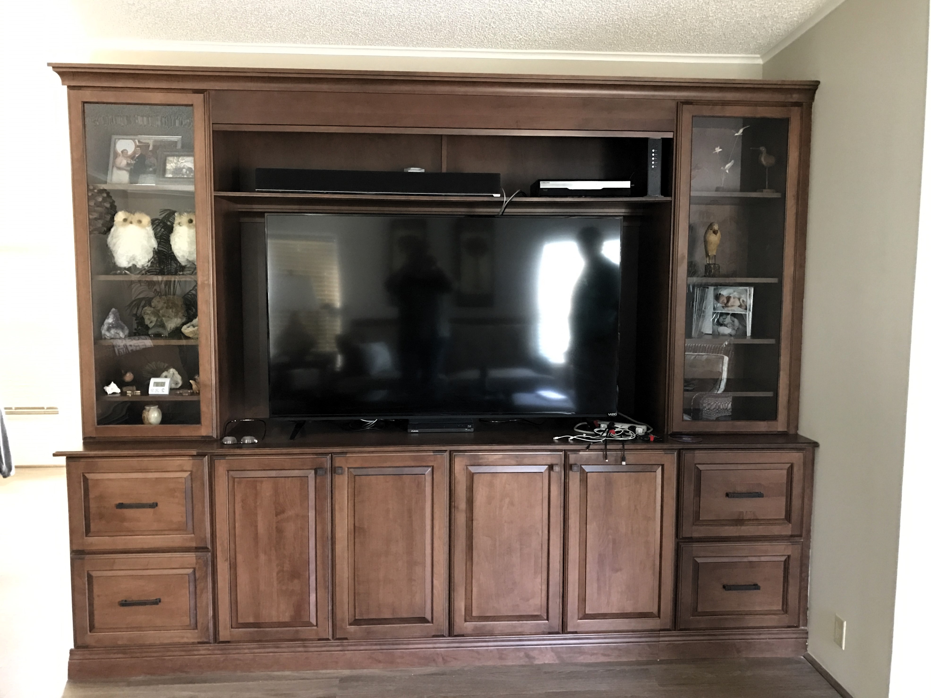 Large semi-custom built Yorktowne cabinetry entertainment center.