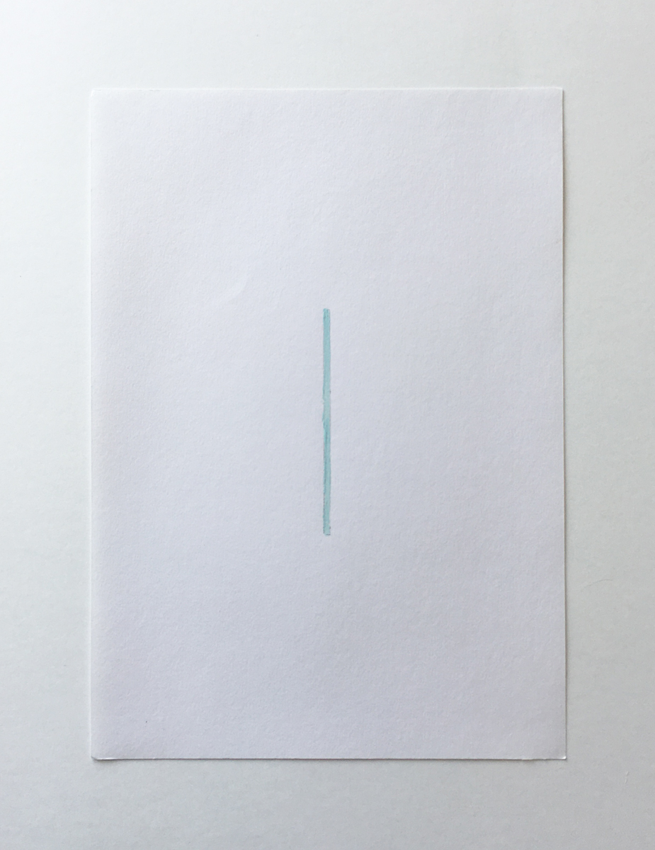 A white piece of paper with a thin straight line of light blue paint in the middle.