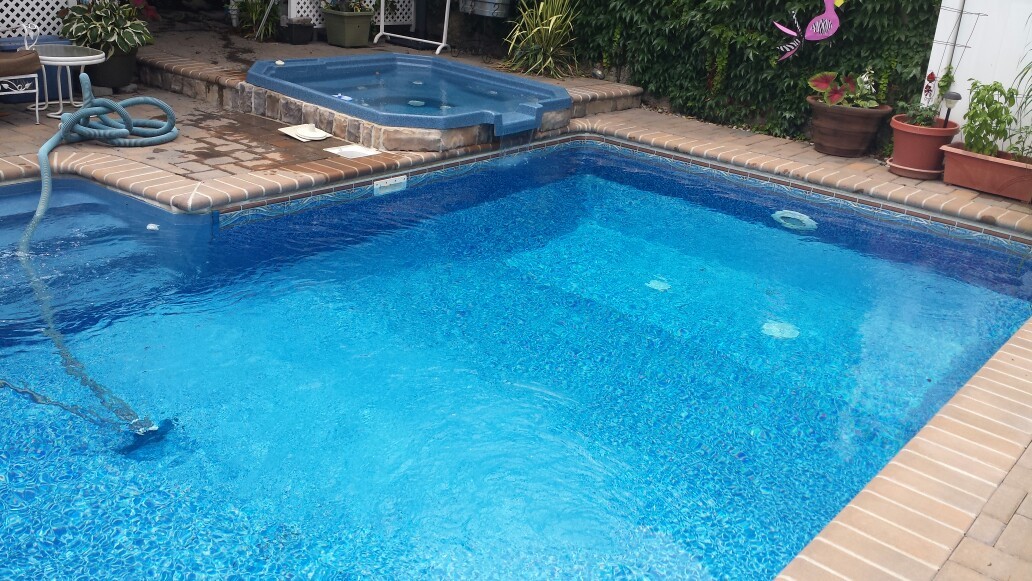 Swimming Pool With Spill-Over Hot Tub