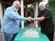 Sargent Thurber Reynolds (L) and Louis Evan Grivetti celebrate publication of their trilogy. 