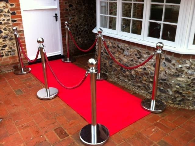 red carpet and rope barrier