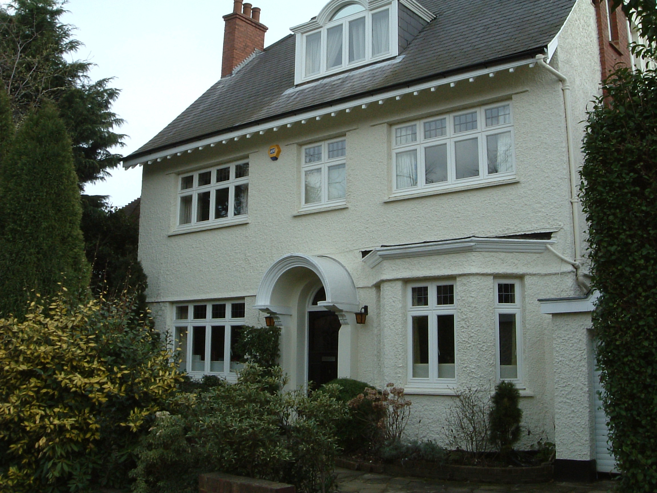 yellow and black marker pen on brown wooden table