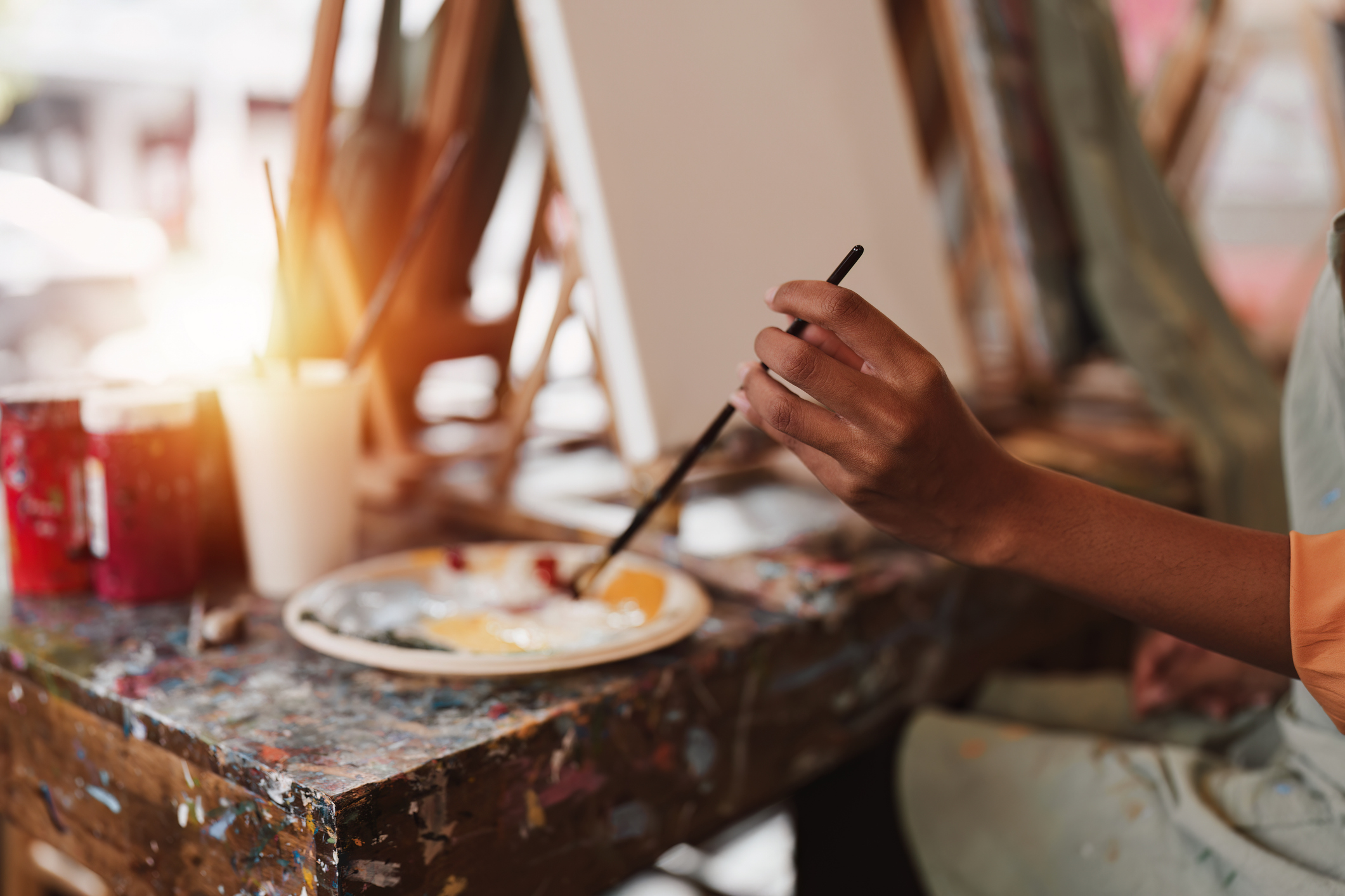 Woman painting in art studio