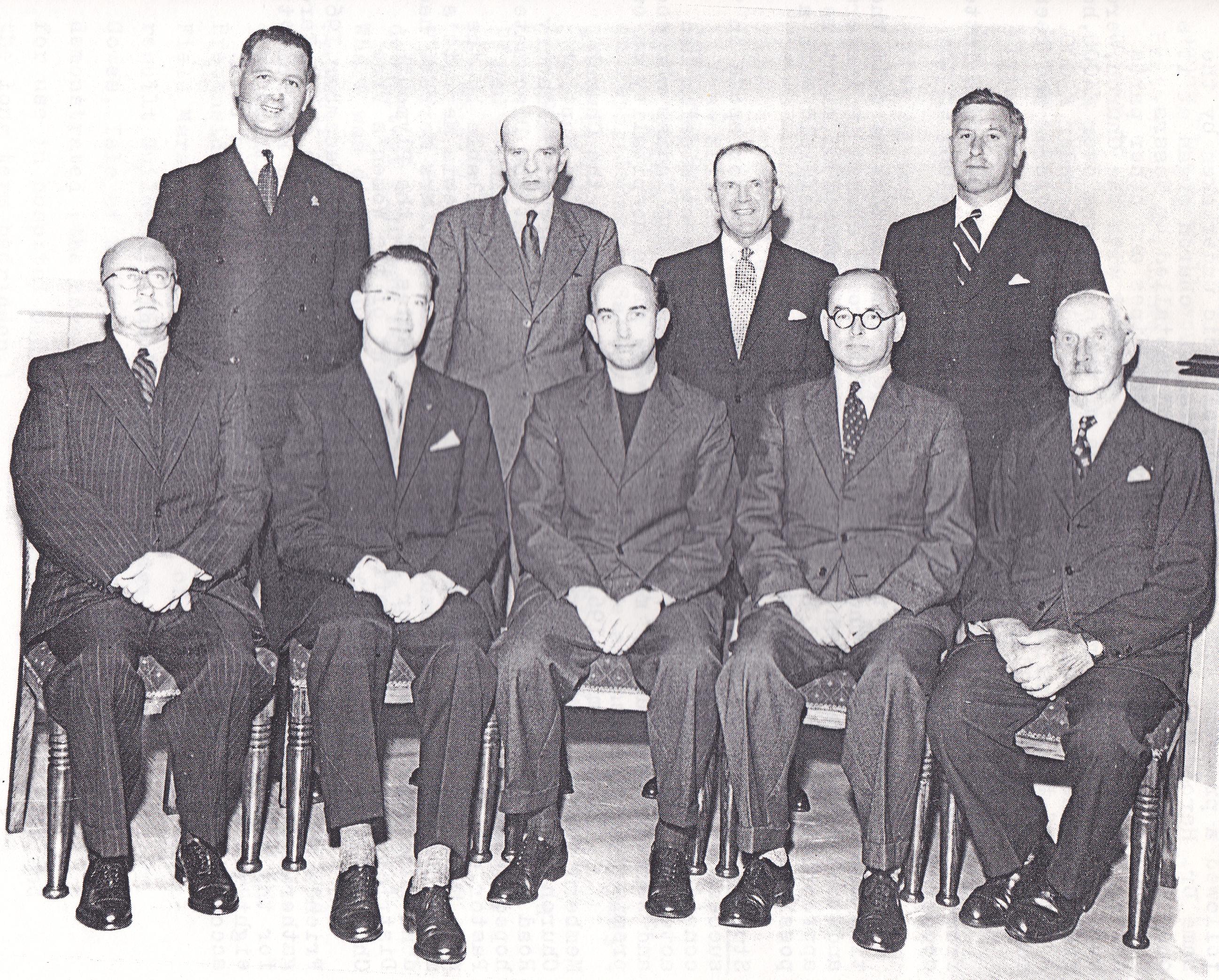 Rev Merrett and the Deacons, (Standing L - R) Mr Hellyer, Mr Keast, Mr H Bray, Mr Hitt, (Sitting L - R) Mr Rich, Mr R. Bray, Rev Merrett, Mr D Beavington and Mr F Beavington.  1958