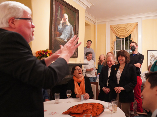 A parlor full of people enjoying Chuck's magic. A parlor full of people enjoying Chuck's magic.