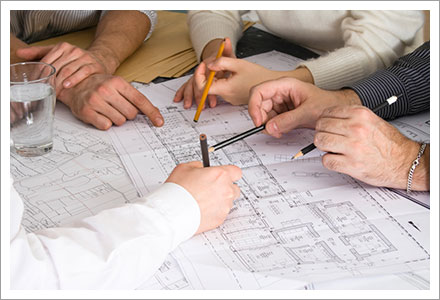 Builders preparing a plan||||
