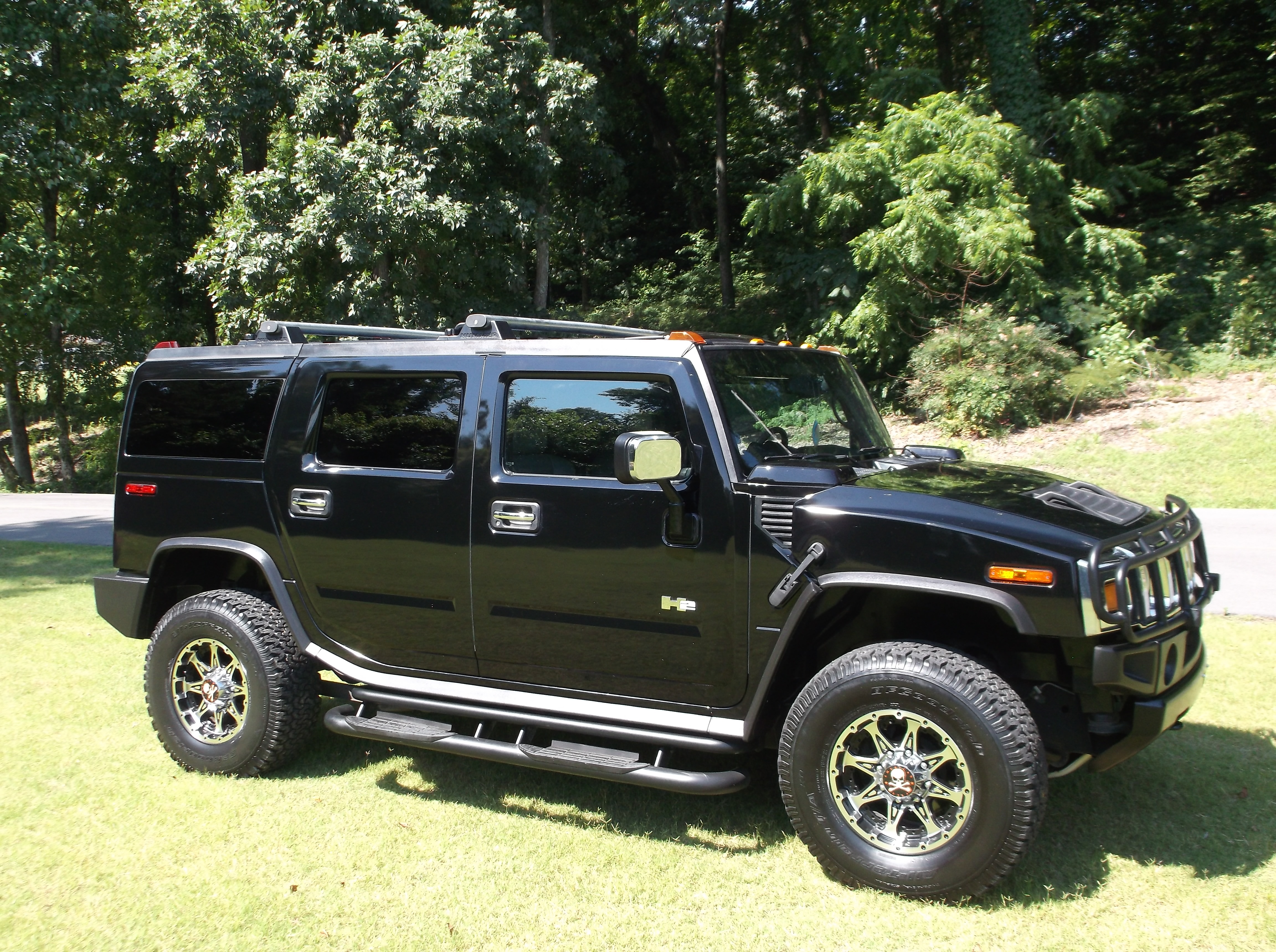 https://0201.nccdn.net/1_2/000/000/14d/348/2003HummerH2Black_0088-4608x3440.jpg