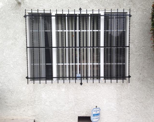 Wrought iron window guard.