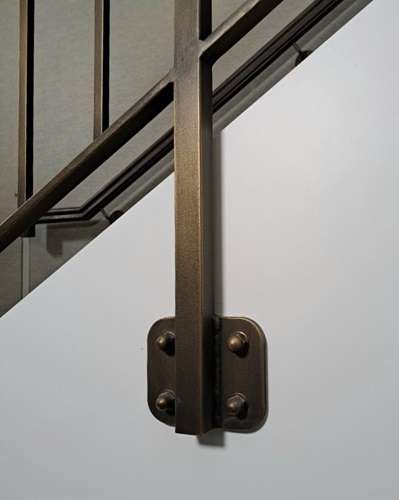 Aged brass finish AM.4 applied on mild steel balustrading by Artistic Metals 