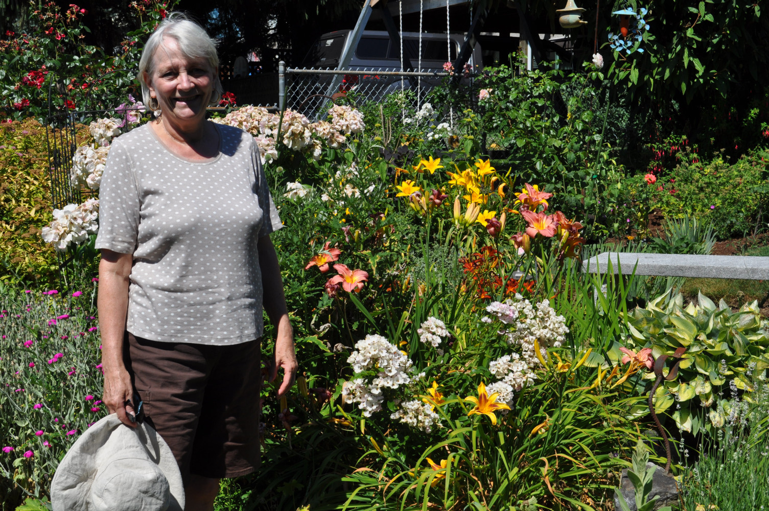 Brenda in her English cottage-style garden in Coquitlam.
