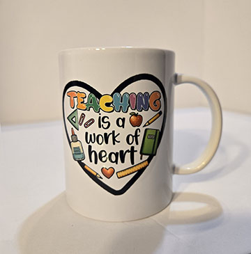 15oz ceramic mug featuring a teaching is a work of heart design