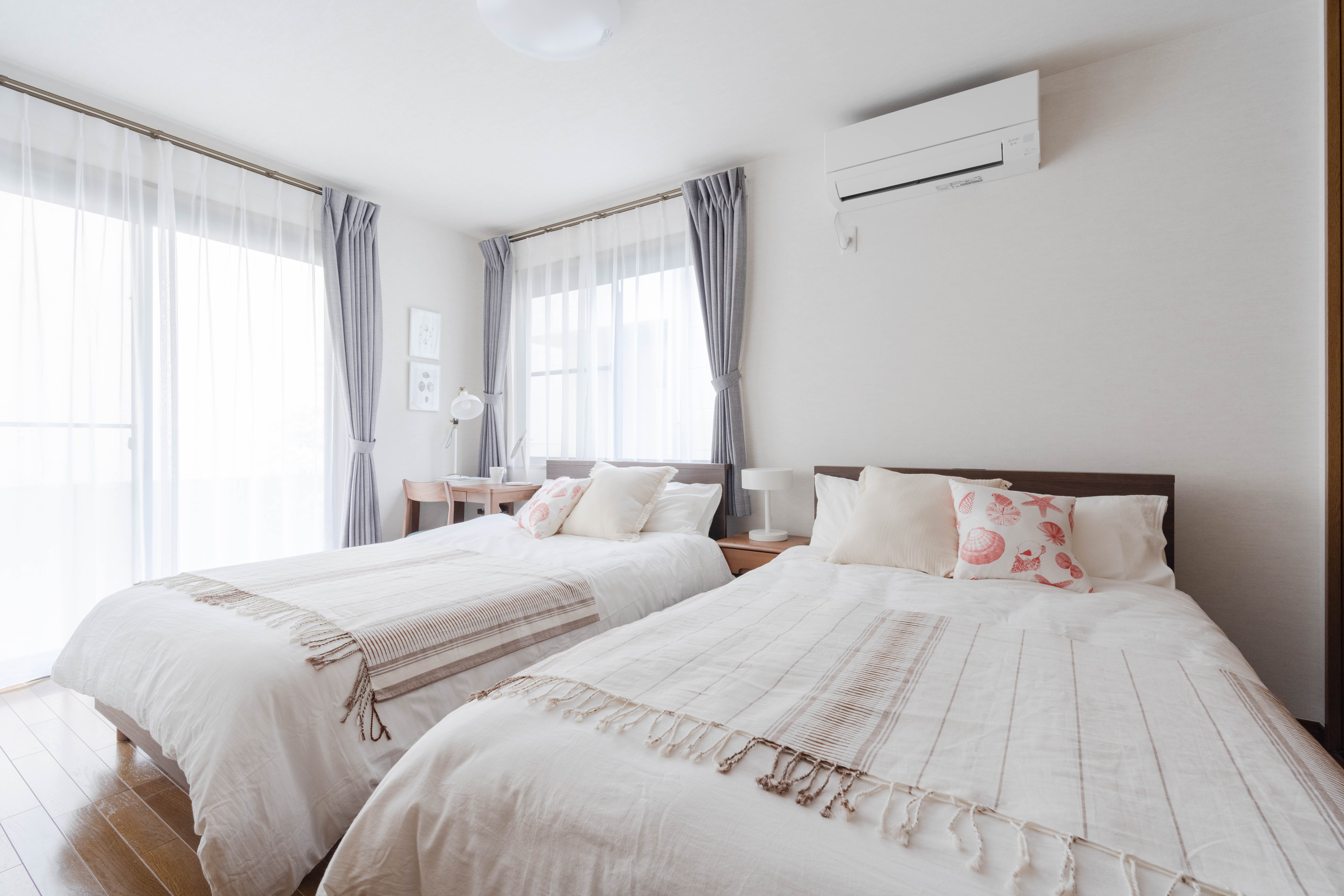 1F bedroom with two double beds