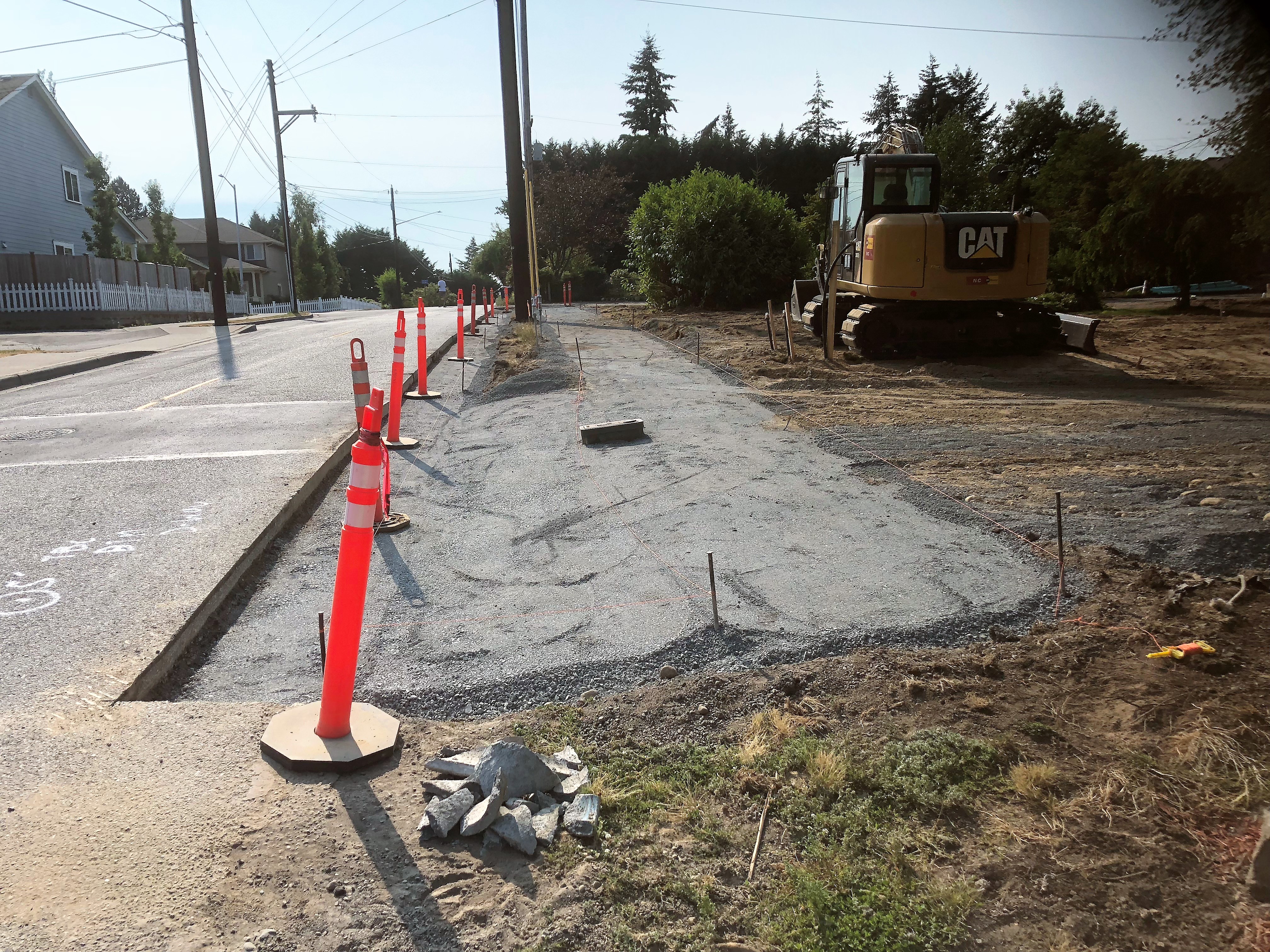 Prepped for concrete sidewalk and driveway