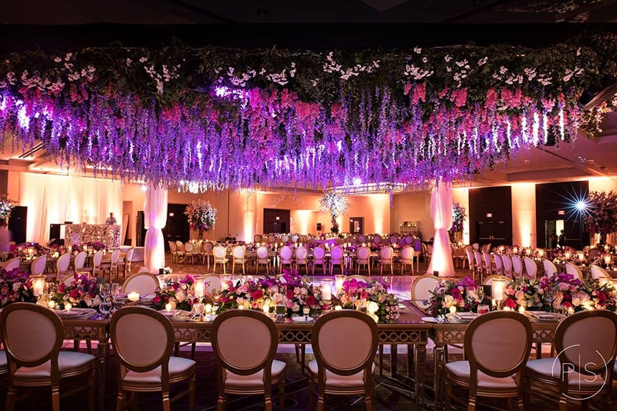 an Unforgettable Floral ceiling for dancefloor, and table centerpieces