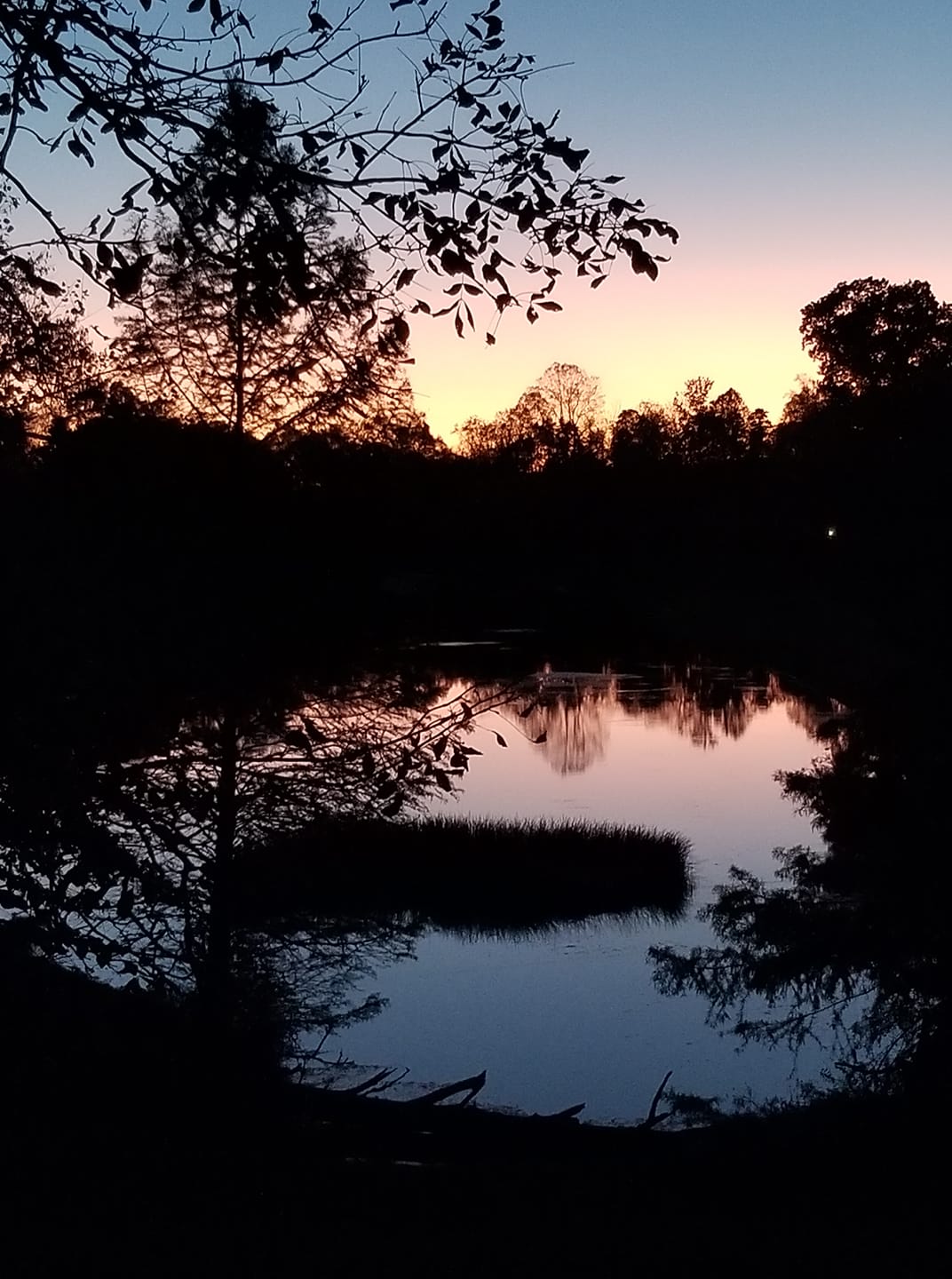 Sunset reflecting in the lower pond