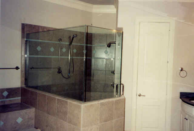 Shower with partial glass enclosure||||