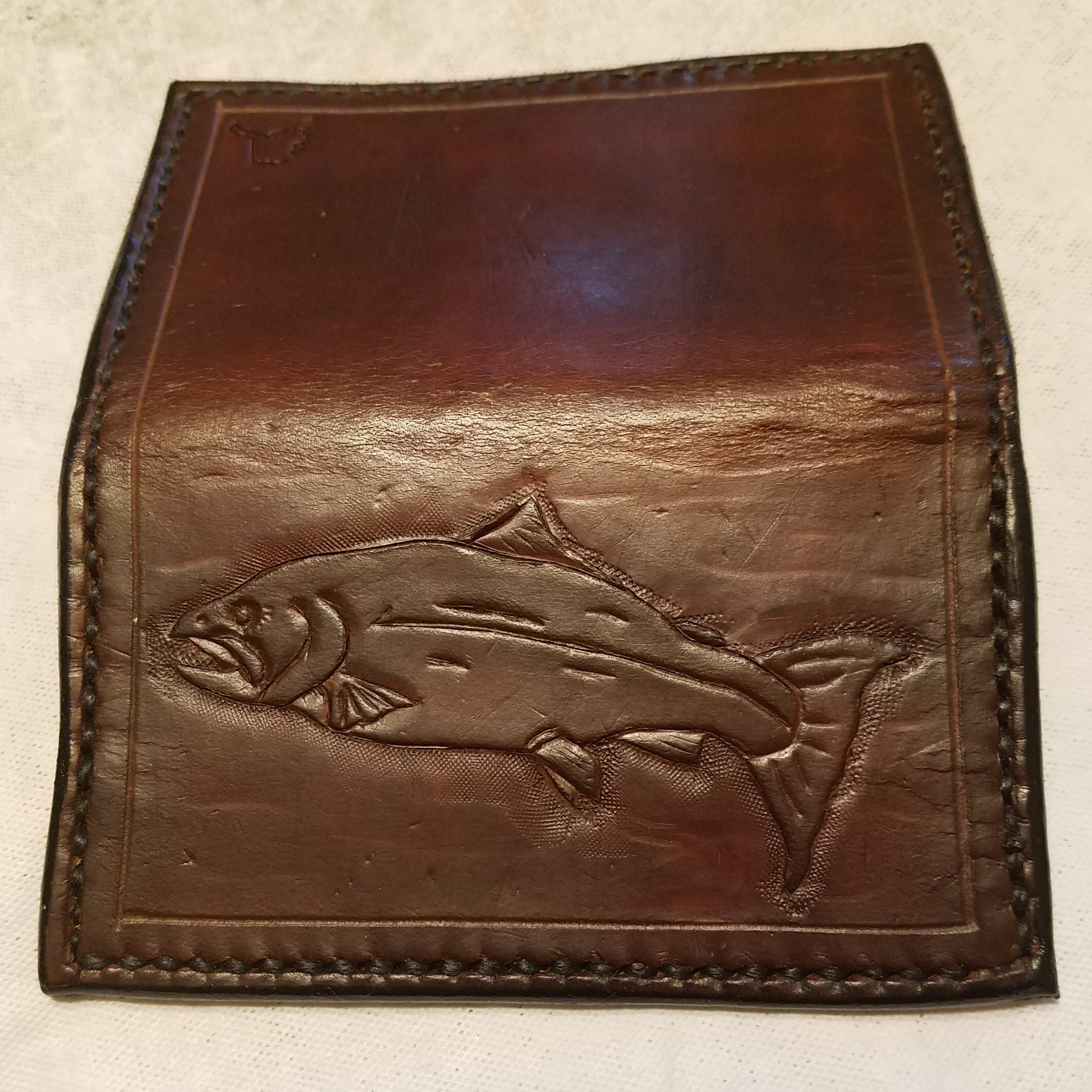 Minimalist 2 pocket wallet, hand tooled and stitched,  $65.00   SOLD