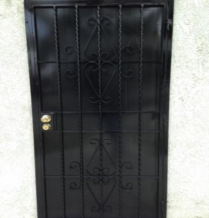 Wrought iron door guard.
