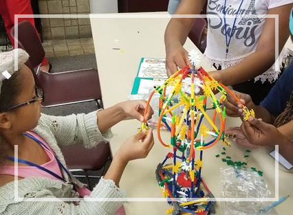 Students building a robot