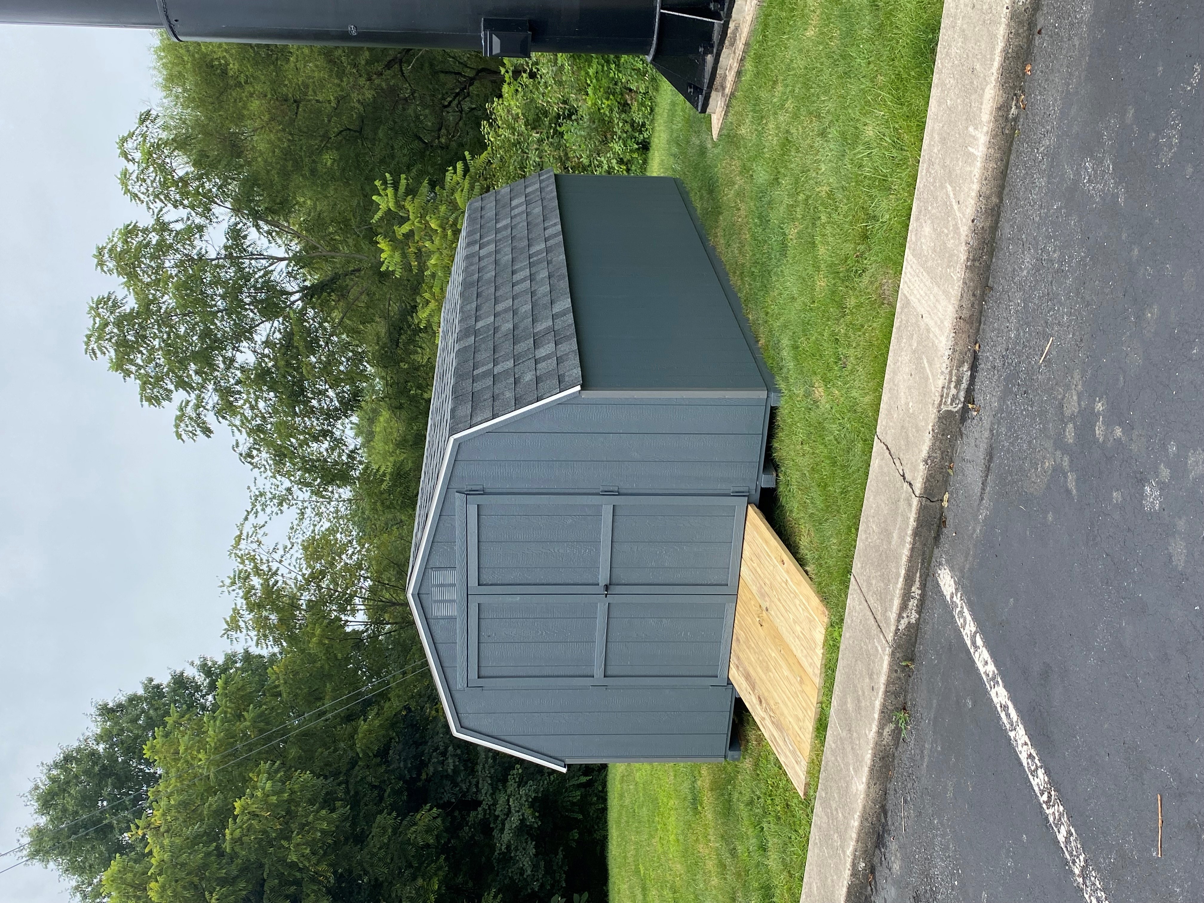 This spacious 10 x 16 Budget Barn is featuring: gray colored T-111 siding, with gray trim, and charcoal gray 30 year architectural shingles with tarpaper underlayment. We are also featuring: gable vents, 5' double doors,  1- 18" x 27" slider window with a screen, pressure treated floor joist and a 5 x 4 treated ramp.

Thank you Anthony, have fun with your spacious shed!