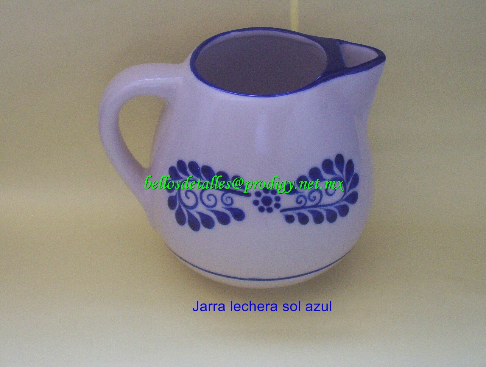 https://0201.nccdn.net/1_2/000/000/156/9b1/Jarra-lechera-sol-azul-1632x1232.jpg