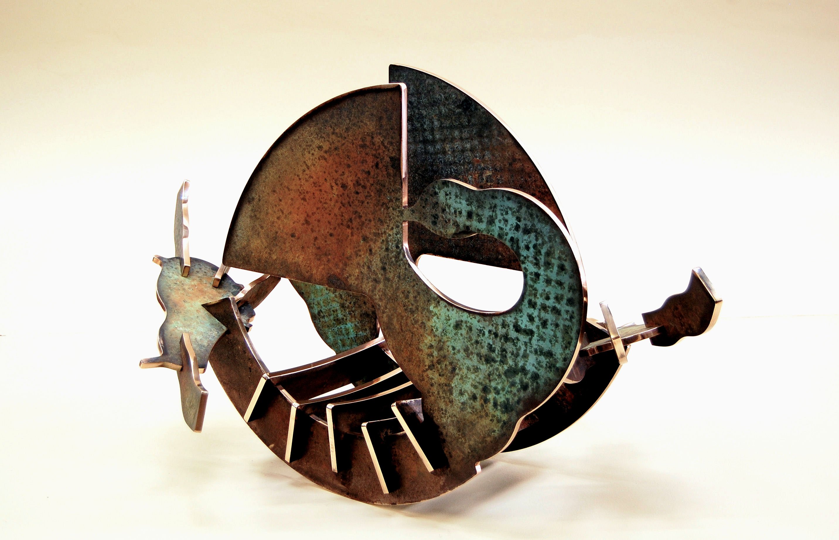 In Retrospect - 2011, Fabricated Bronze with Hot Patina, 23” x 43” x 26” 
