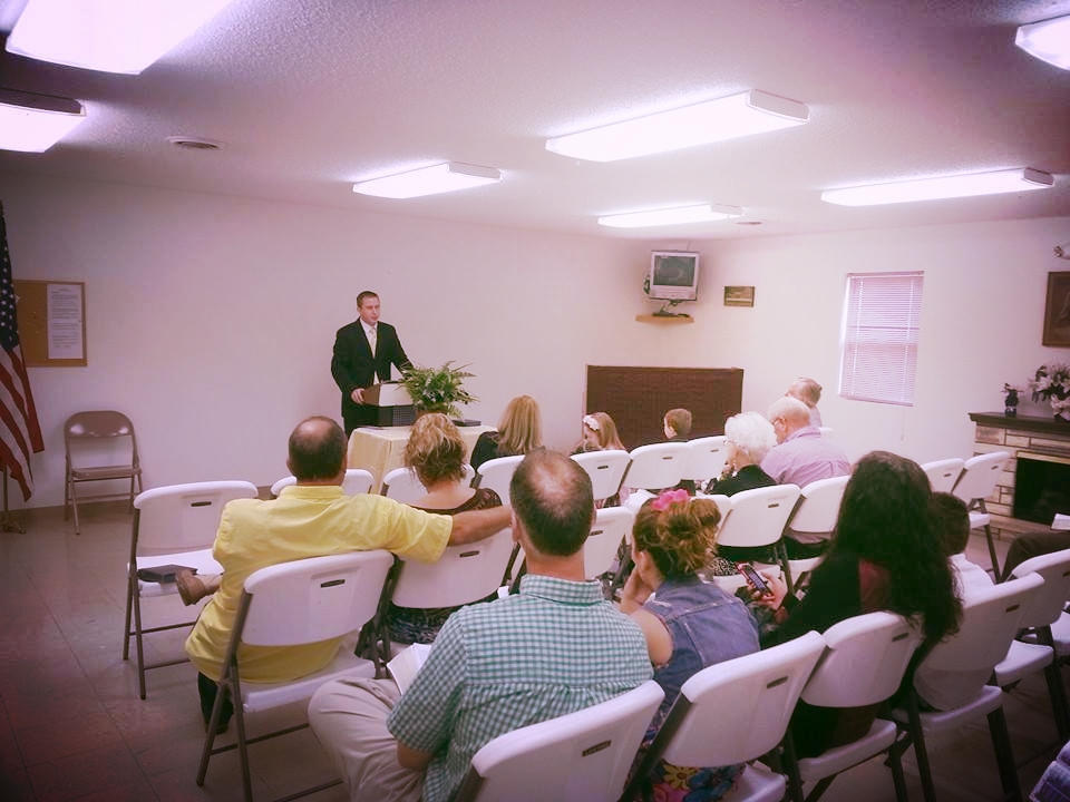 Pastor Dustin welcoming everyone at the first service